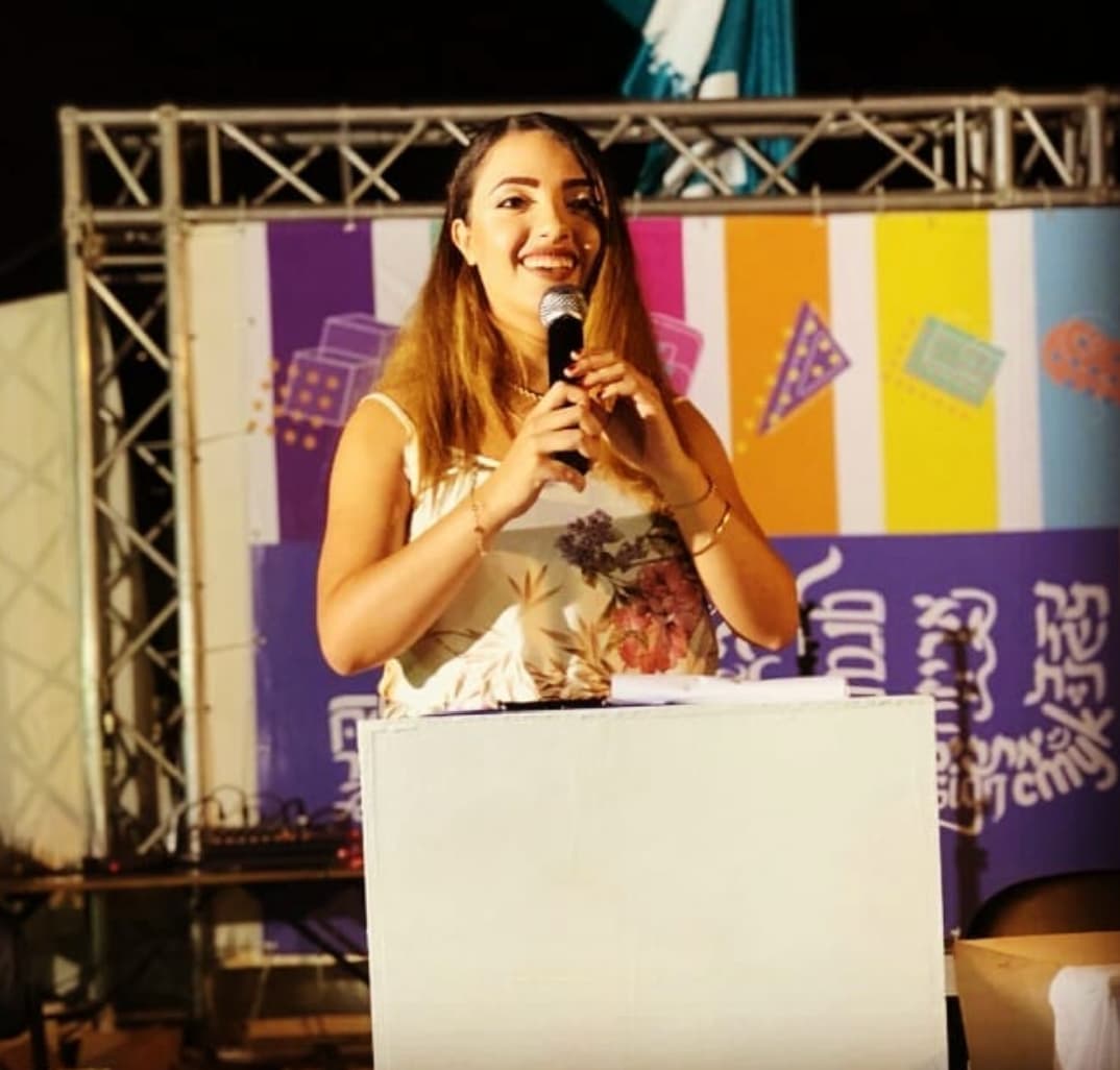 Ghinwa speaking at an event
